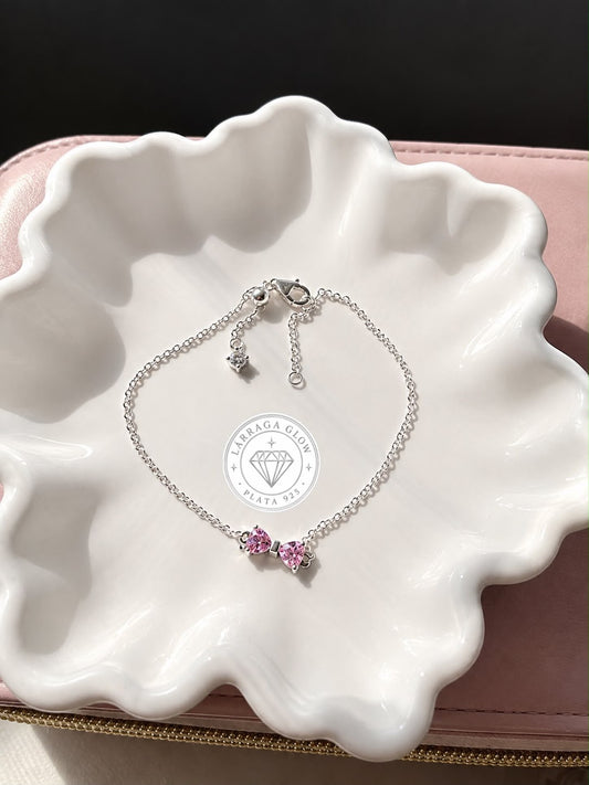 Pulsera de cadena con lazo rosa brillante